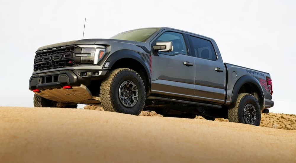 A gray 2026 Ford F-150 Raptor R parked offroad.