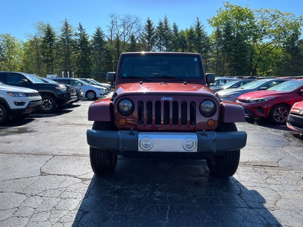 Used 2010 Jeep Wrangler Unlimited Sahara with VIN 1J4BA5H10AL215176 for sale in Saint Clair, MI