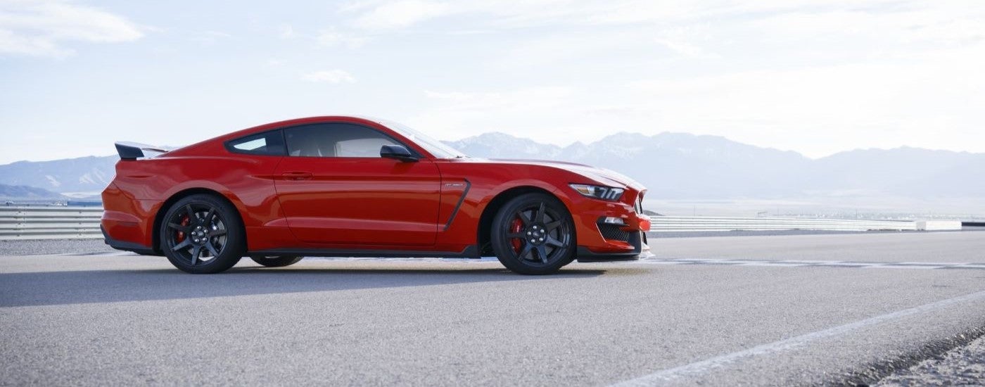 Side view of a red 2020 Ford Mustang GT350