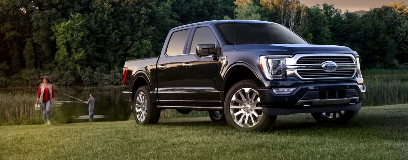 Blue 2021 Ford F-150 parked by a lake