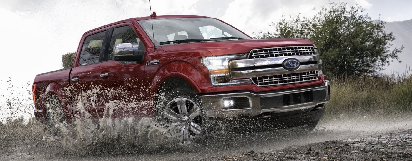Red 2018 used Ford F-150 for sale off-roading